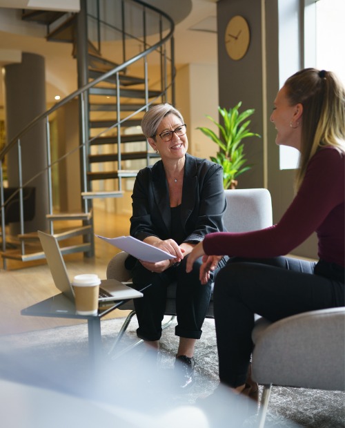 two ladies meeting in office